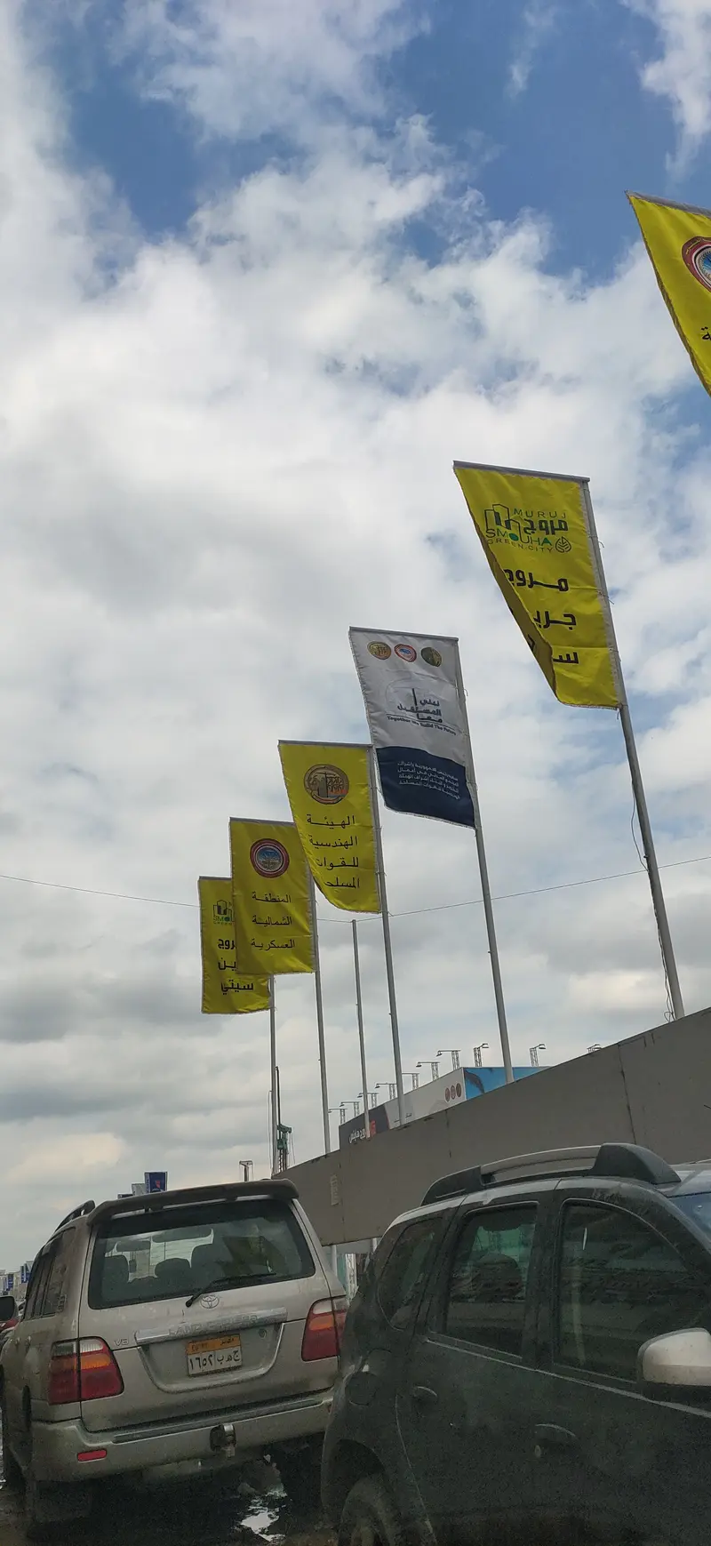 Mockup: project banners on the poles of a real street